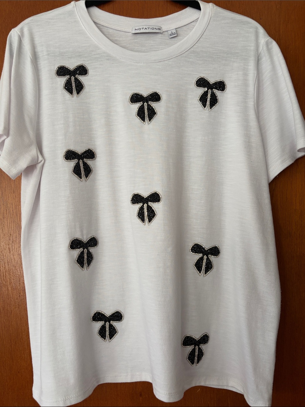 Notations White Tee with Black Beaded Bow Appliqués